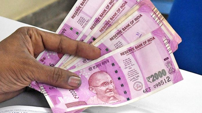 Rupee rises 10 paise to close  at 84.31 against US dollar