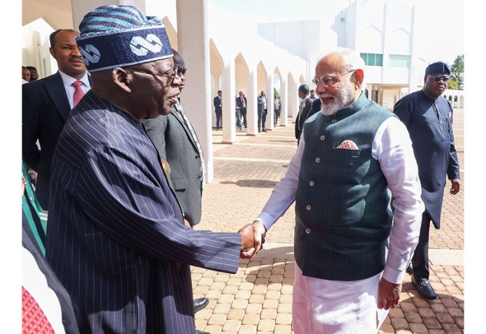 Prime Minister Narendra Modi at the ceremonial reception at Presidential Villa in Abuja, Nigeria on Sunday.(UNI)