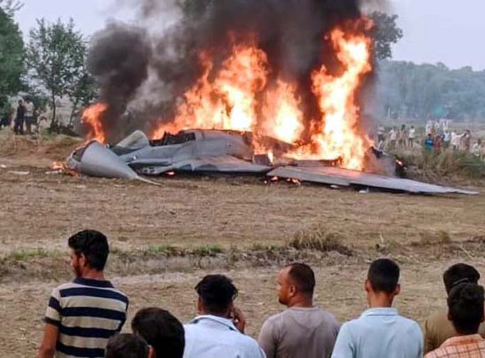 Burning IAF MiG-29 fighter jet which crashed in Agra on Monday.