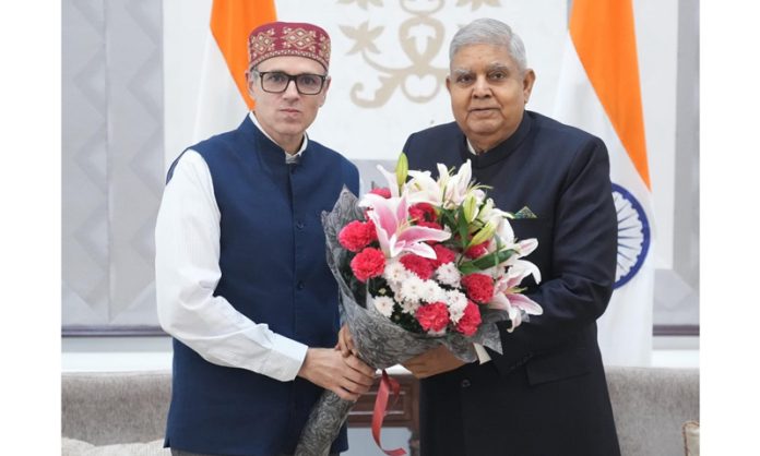 Chief Minister Omar Abdullah and Vice President Jagdeep Dhankhar exchanging greetings in New Delhi on Wednesday.