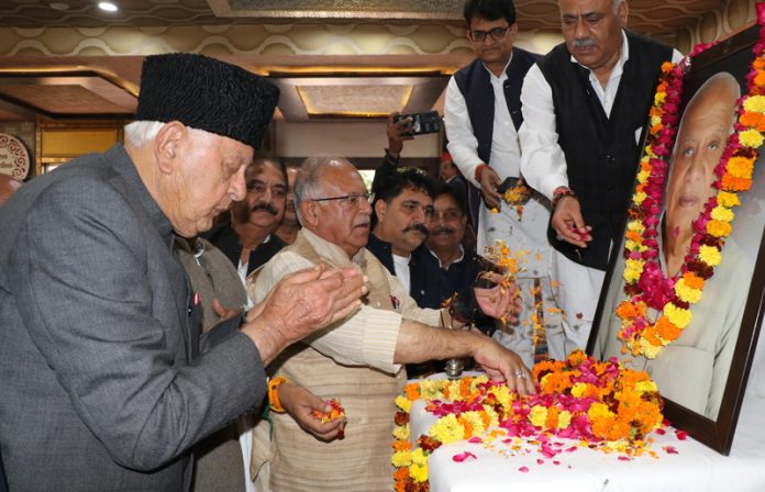 NC chief Dr Farooq Abdullah, JKPCC president Tariq Hameed Karra and others paying tribute to Pt Mangat Ram Sharma at a function in Jammu. —Excelsior/Rakesh