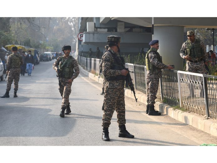 Security forces near spot after militants hurled grenade at flea market in Srinagar on Sunday. - Excelsior/Shakeel