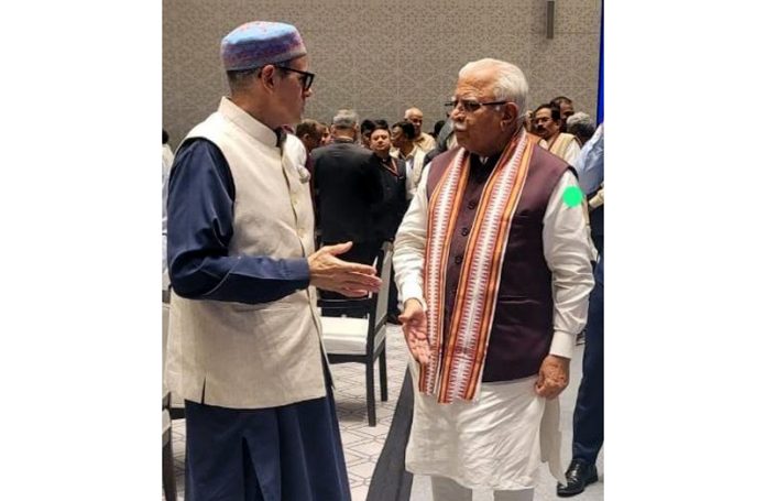 CM Omar Abdullah with Union Power Minister Manohar Lal in New Delhi on Tuesday.