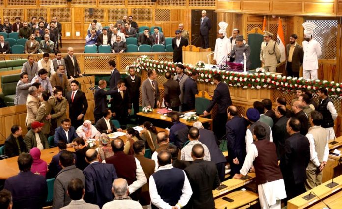 BJP members protest as PDP MLA Waheed Parra brings resolution on Article 370 in the Assembly on Monday. -Excelsior/Shakeel