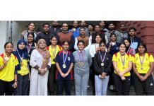 Winners of Inter Collegiate Power and Weight Lifting Championships pose for a photograph in Jammu.