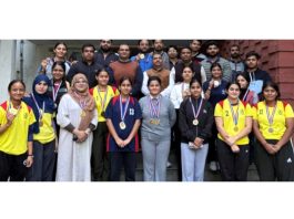 Winners of Inter Collegiate Power and Weight Lifting Championships pose for a photograph in Jammu.