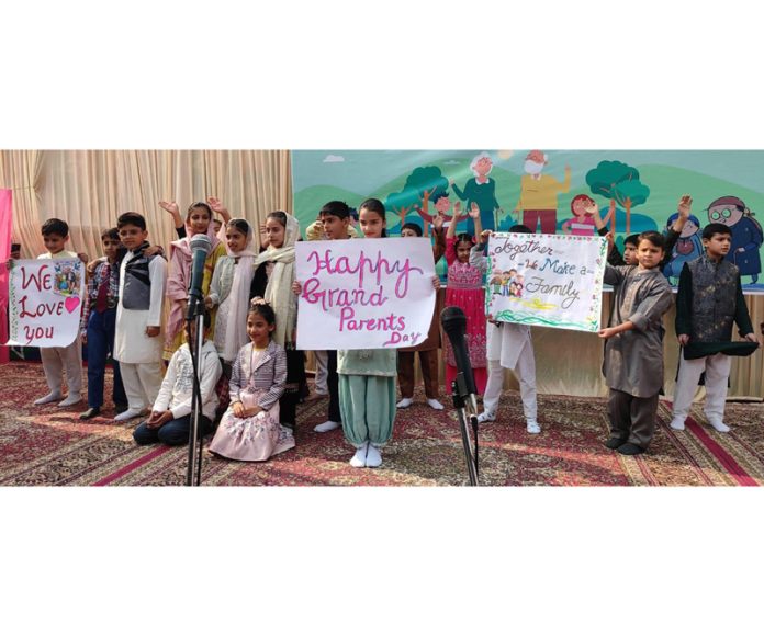 Students holding banners during Annual Day event of J&K Police Public School, Srinagar.