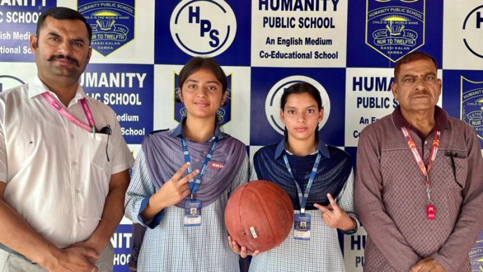 Selected girls of Humanity Public School posing along with medals.