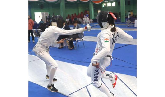 Fencers in action during 3rd day of All India Inter-University Fencing Championship at Jammu University. -Excelsior/Rakesh