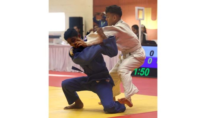 Judo athletes showing their skills during a match at Jammu. -Excelsior/Rakesh