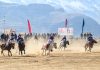 Players in action during 4th LG Cup Horse Polo-2024 tournament at Goshan Stadium in Drass.