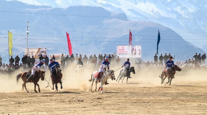 Players in action during 4th LG Cup Horse Polo-2024 tournament at Goshan Stadium in Drass.