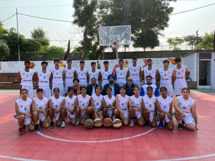 J&K Basketball teams posing along with dignitaries.