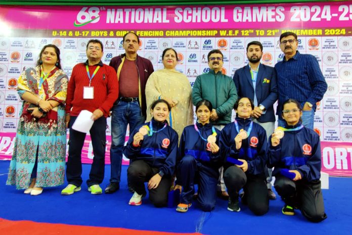 J&K fencers posing along with dignitaries during 68th National School Games at Jammu.