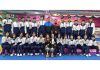 Winners in ongoing 68th National School Games pose for a group photograph with others at Jammu on Thursday.