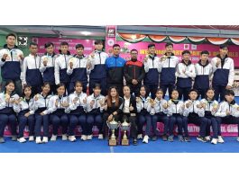 Winners in ongoing 68th National School Games pose for a group photograph with others at Jammu on Thursday.