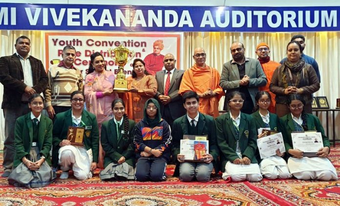 DPS Jammu students pose for a photograph with others after excelling at Youth Convention organized by Ramakrishna Mission.