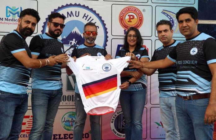 Excelsior Sports Correspondent JAMMU, Nov 16: The 5th edition of the MMM Jammu Duathlon 70.3 is all set for its grand kickoff on November 17, with the unveiling of the event jersey today at the Bib Expo. The unveiling was accompanied by a special ceremony honouring 25 athletes from across India, who will participate in the exciting event combining cycling and running. The competition will take place at Mehtab Palace, Miran Sahib, Jammu, with the first race starting at 4:00 am. Since its inception in 2020, the Jammu Duathlon 70.3 has grown into a prominent event in the region, organized by the Jammu Hills Sports Club Foundation. This year, the duathlon will feature several categories designed for athletes of all levels: Sprint Duathlon (1.5 km Run, 20 km Cycle, 3 km Run) for ages 12-18. Olympic Duathlon (1.5 km Run, 40 km Cycle, 10 km Run) for ages 16 and above. Duathlon 70.3 (1.9 km Run, 90 km Cycle, 21 km Run) for ages 18 and above. The event will also host relay categories for team participants. Brigadier Harcharan Singh (Retd.), Director North, WWF, will be the chief guest, adding prestige to this exciting competition.