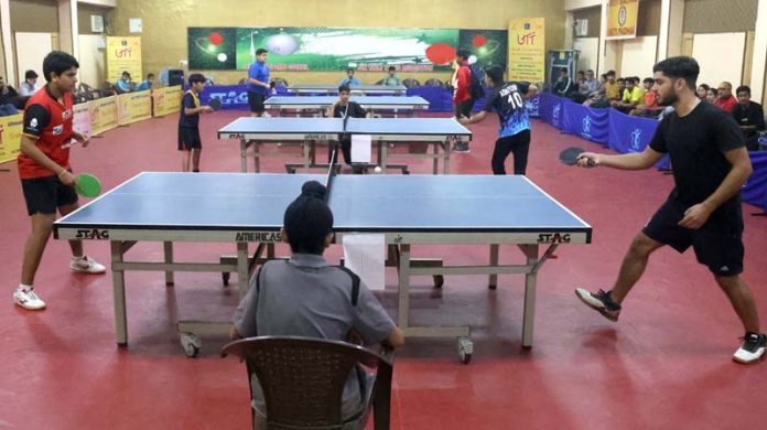 Table Tennis players displaying their skills during a match at MA Stadium on Saturday. -Excelsior/Rakesh