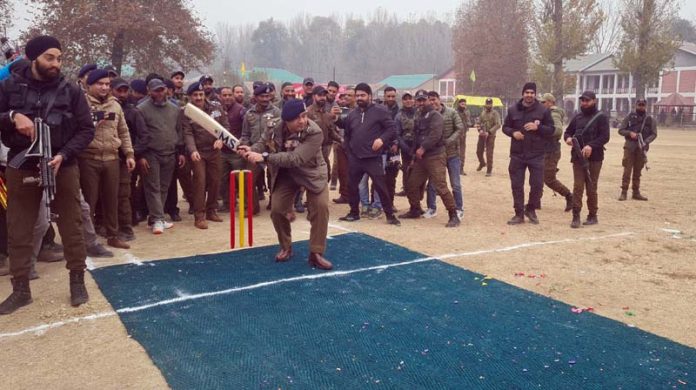 IGP Kashmir VK Birdi displaying his batting skills to inaugurate Police Martyrs T-20 Cricket Tournament at SHMGDC ground, Anantnag. -Excelsior/Sajad Dar