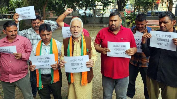 BJP VDGs Cell holding protest at Jammu on Saturday. -Excelsior/ Rakesh