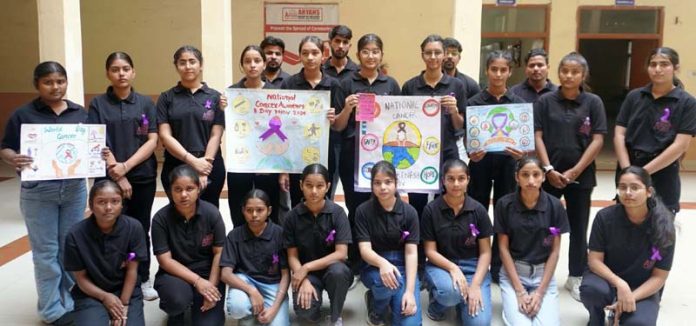 Students posing for a group photograph during a function organized at Aryans Institute on Thursday.