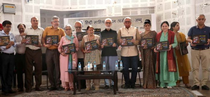 Literary personalities releasing multi- lingual poetry book by Vijay Saraf Meenaghe at Jammu on Thursday. -Excelsior/Rakesh