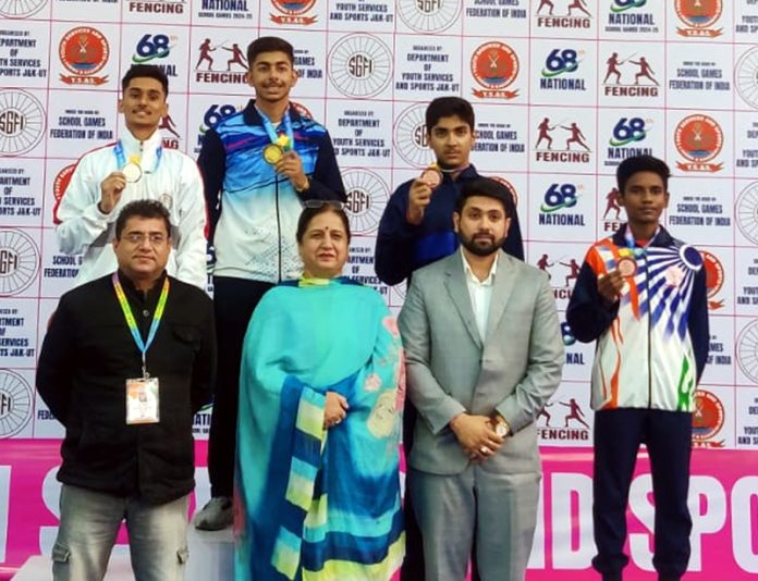 Fencers display medals they won in the ongoing 68th NSG in Jammu on Wednesday.