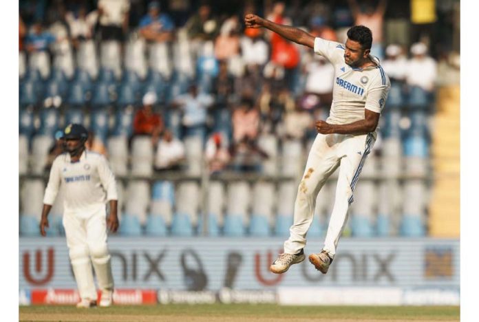 Ravichandran Ashwin celebrates wicket of New Zealand's Glenn Phillips on the second day of the third test cricket match between India and New Zealand at Wankhede Stadium, Mumbai.