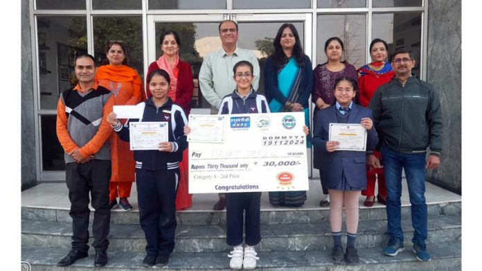 Heritage School students display prizes they won in competition on ‘Energy Conservation.’