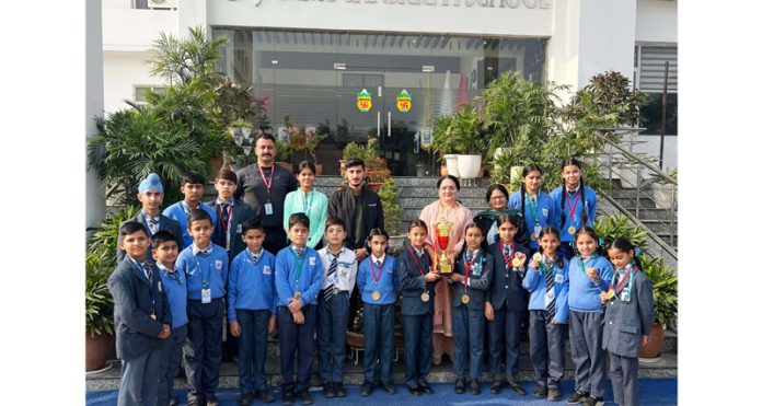 Students of Jammu Sanskriti School pose for a photograph after winning medals at 27th Jammu District Taekwondo Championship 2024-25.