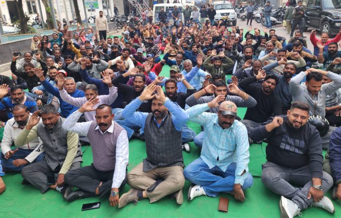 Civic Safai Karamcharis of JMC raising slogans during a protest demonstration in Jammu on Tuesday. -Excelsior/Rakesh