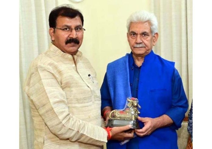 Governor Manoj Sinha meeting MLA Arvind Gupta.