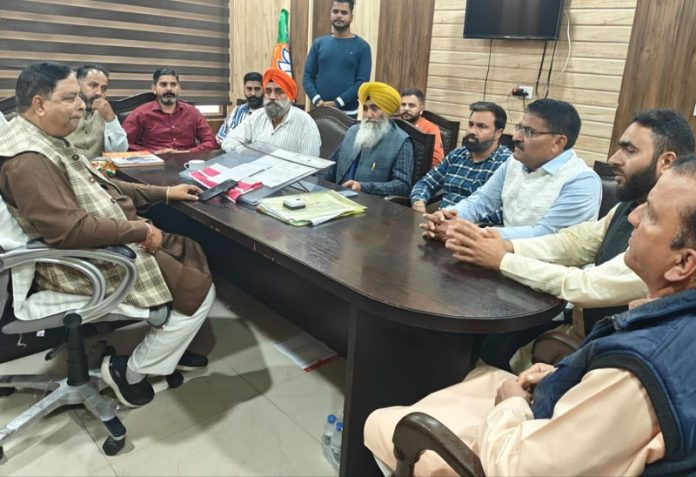 BJP JK UT president, Sat Sharma addressing a meeting of party activists from Rajouri and Poonch at Jammu on Monday.