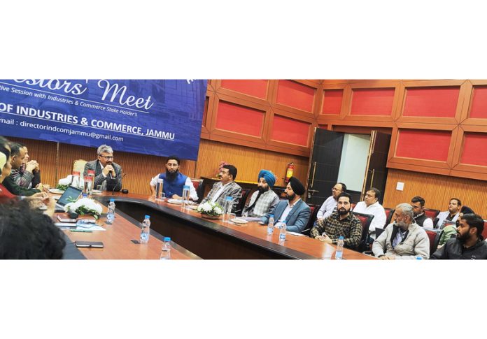 Director of Industries and Commerce Department Jammu chairing Investors Meet.