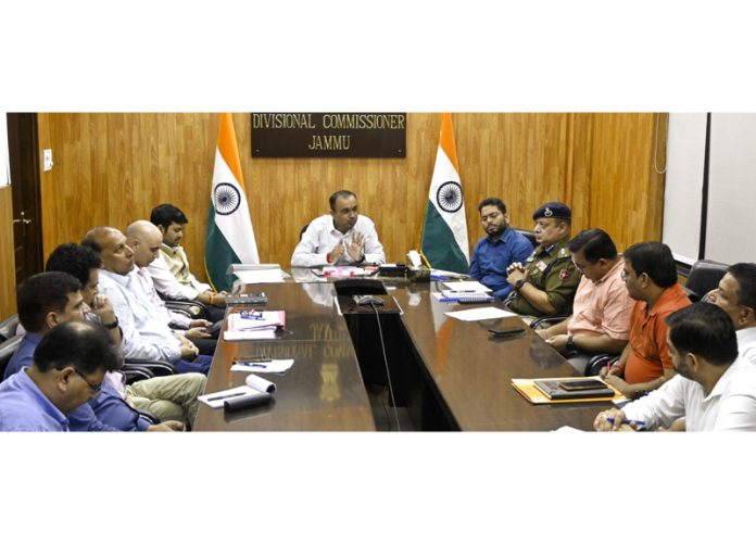 Div Com chairing a meeting on Tuesday.