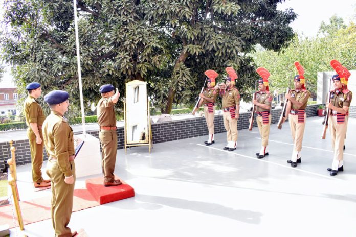 ADGP Jammu Zone Anand Jain taking salute from police contingents in Poonch on Monday.