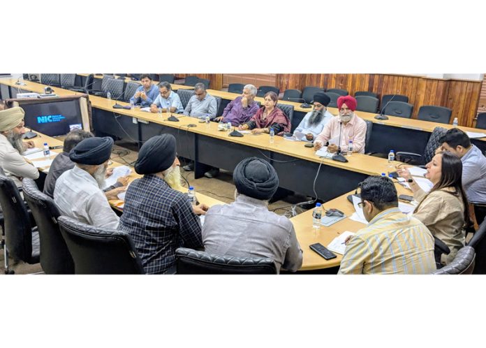 ADC Jammu chairing a meeting on Friday.