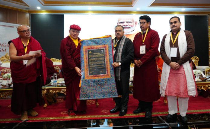 Thuksey Rinpoche handing over an appreciation letter to BJP national general secretary, Tarun Chugh at Leh on Wednesday to be presented to PM Narendra Modi.