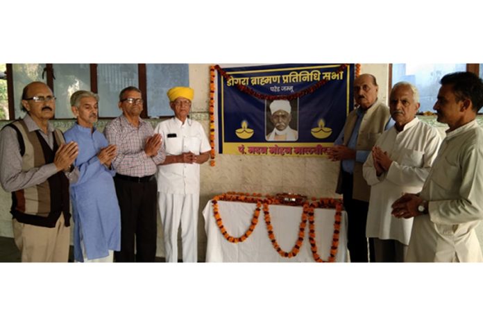 Members of DBPS paying their tribute to Pt. Madan Mohan Malaviya in Jammu on Tuesday.