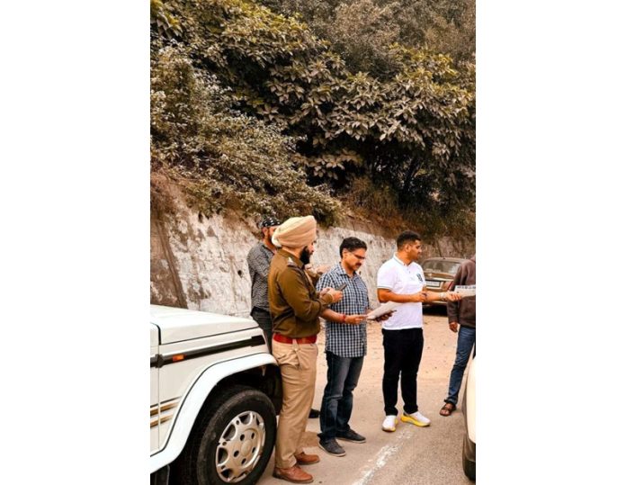 Transport Department staff inspecting vehicles along the Jammu-Srinagar National Highway on Saturday.