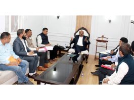 Deputy Chief Minister Surinder Kumar Choudhary chairing a meeting.