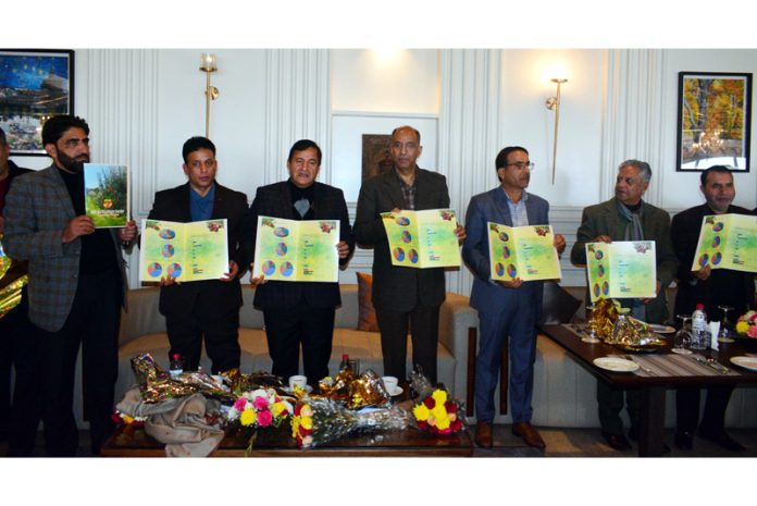 Dignitaries releasing a booklet on horticulture during felicitation ceremony on Sunday.