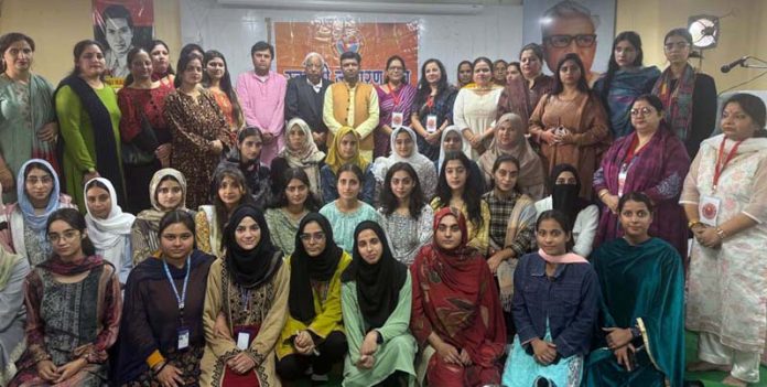 Guests and participants posing together during a function organized to commemorate birth anniversary of Ahilya Bai Holkar.