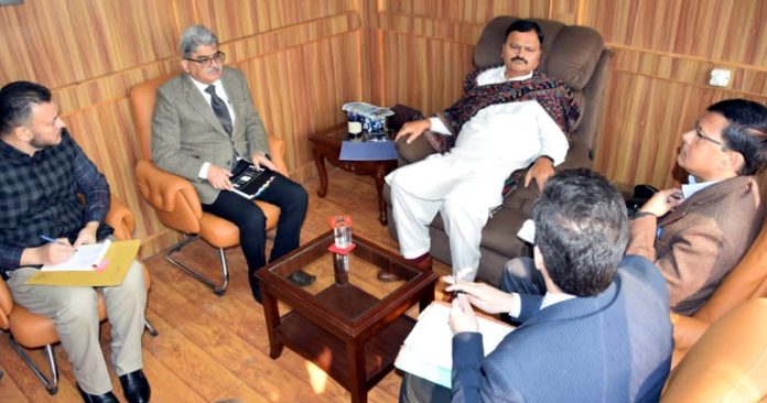 Minister Javed Rana chairing a meeting on Thursday.