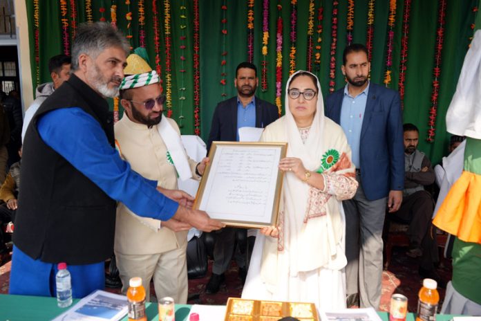 Chairperson J&K Waqf Board, Dr Darakhshan Andrabi distributing awards during a function in Kishtwar.