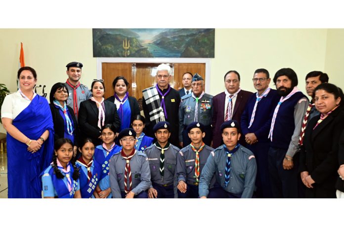 LG Manoj Sinha posing for a photograph with the volunteers and officials of J&K Bharat Scouts & Guides in Jammu.