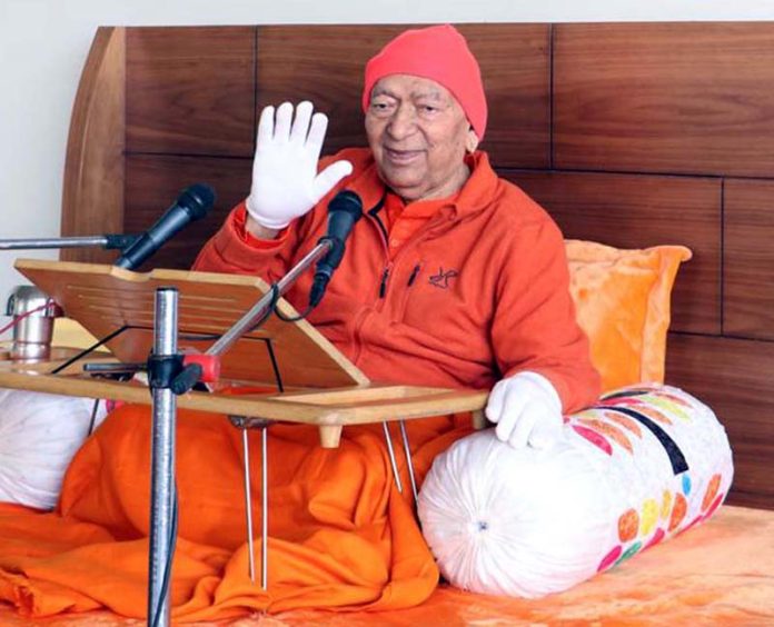 Swami Ram Swarup Yogacharya delivering Vedic sermons at the residence of MLA Jasrota Rajiv Jasrotia on Friday.