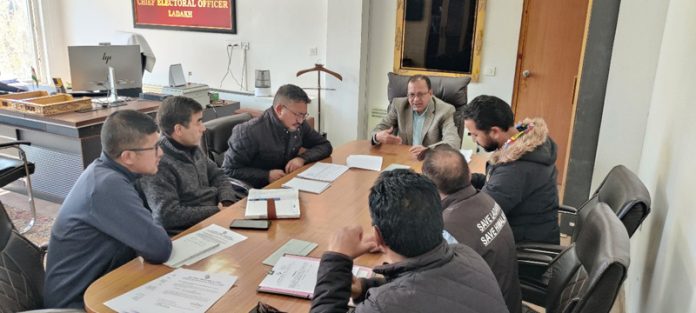 CEO Yatindra M Maralkar chairing a meeting with representatives of political parties in Ladakh on Tuesday.