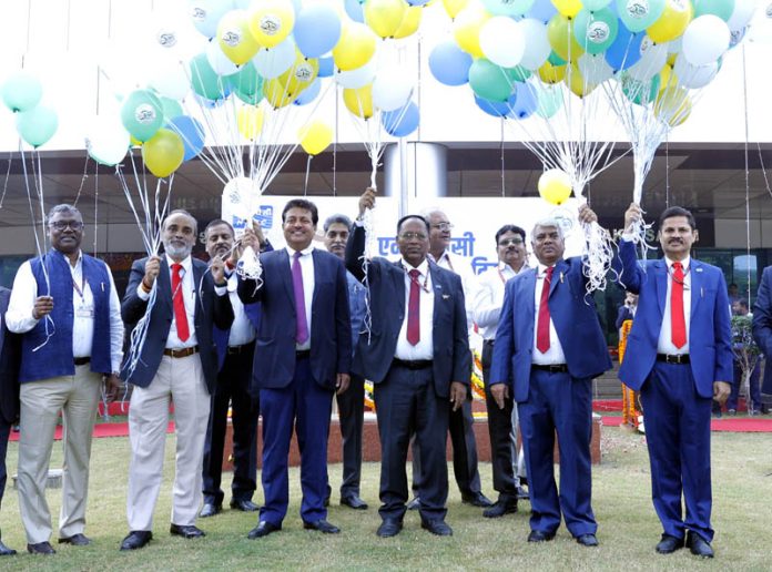 NHPC dignitaries releasing balloons to celebrate 50th Raising Day in Faridabad on Thursday.